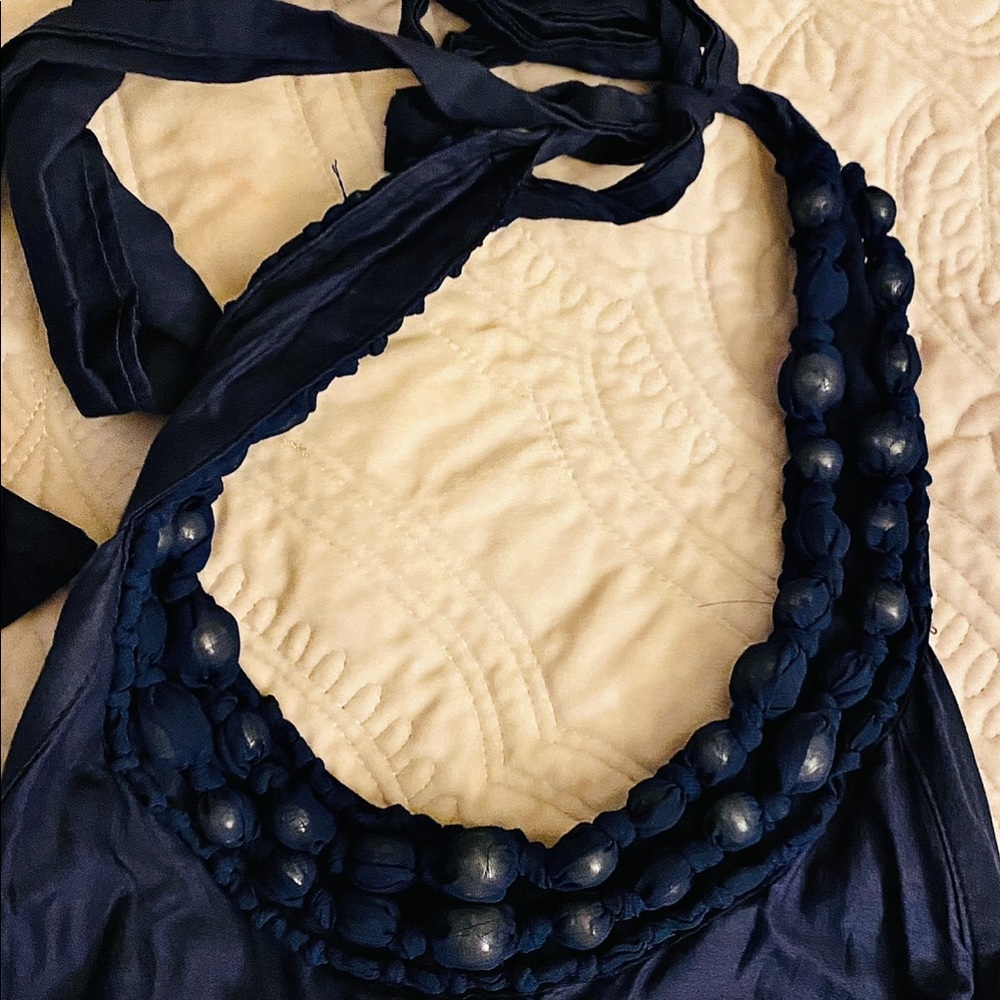 Awesome wood pebble collar like spring dress